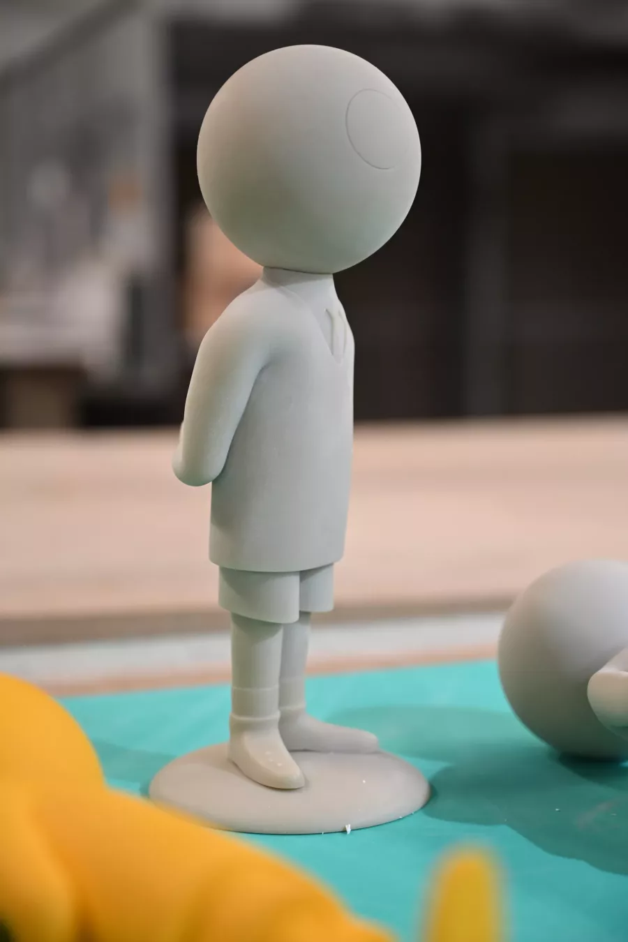 Visuel présentant un modèle de personnage miniature issu d'une petite-série réalisée par Creaform